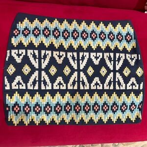 Navy embroidered mini skirt